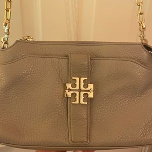 Tory Burch gray and gold cross body bag with pockets